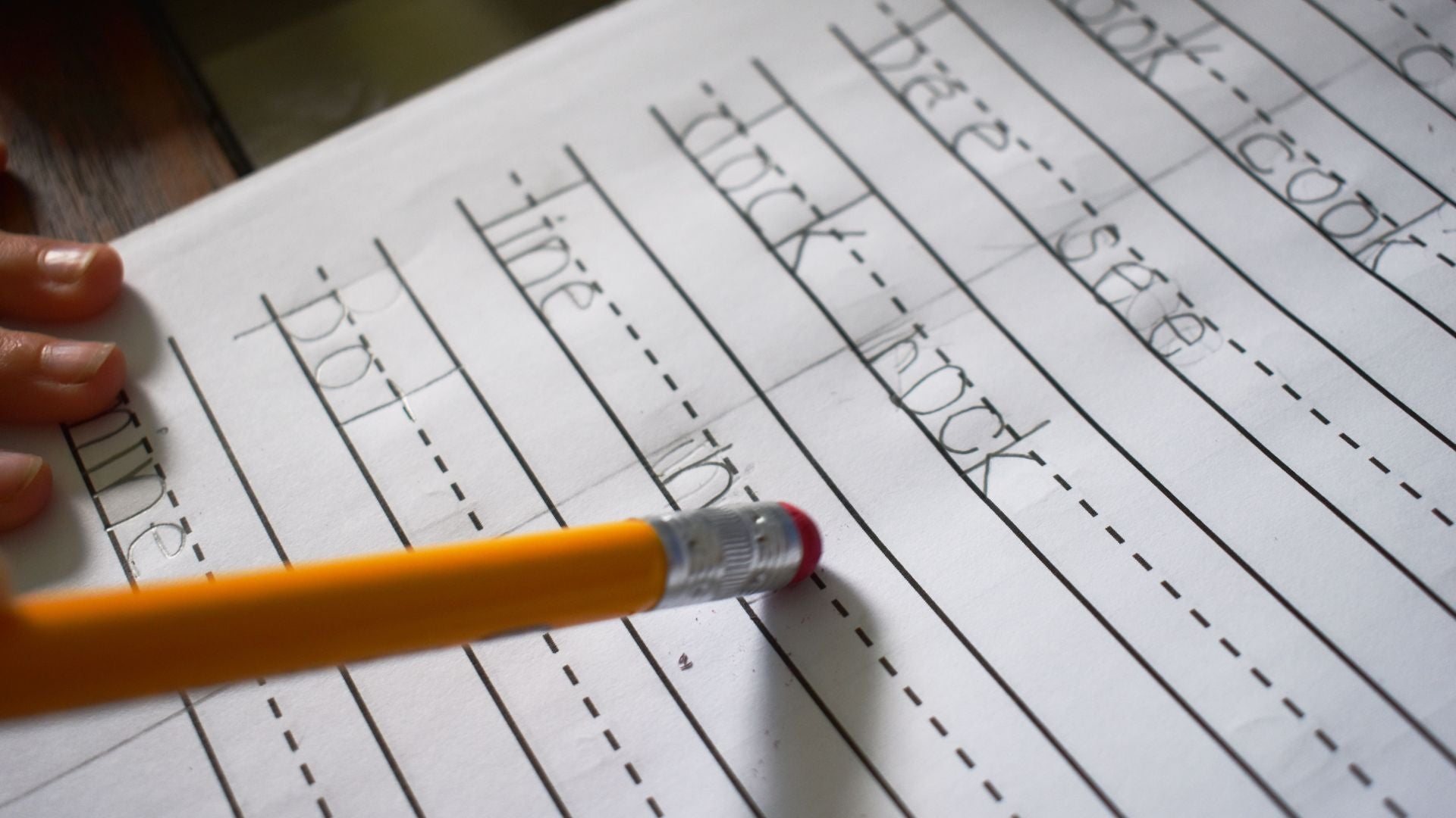 Handwriting on paper with frequent spelling errors—showing dyslexia symptoms in writing.